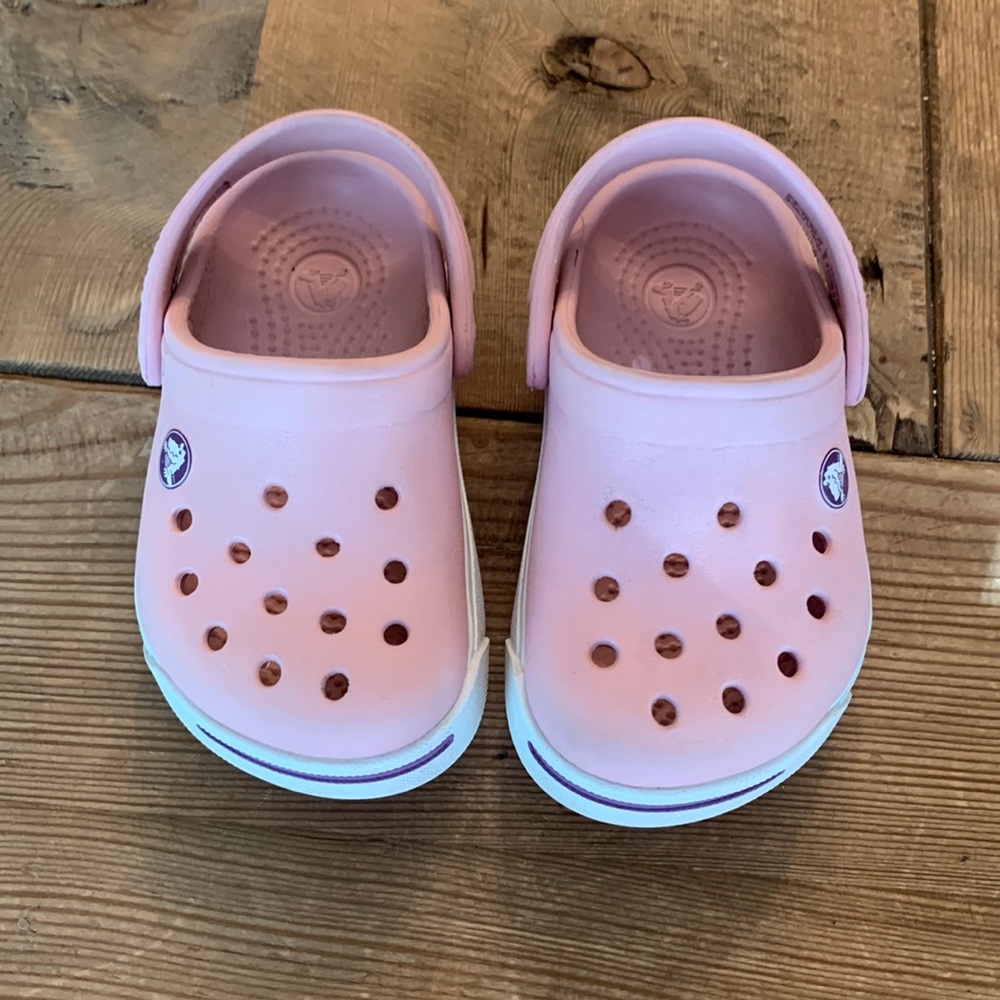 Pale pink Crocs in walker 4/5